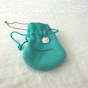 Tiffany Notes Alphabet disc charm pendant in “A”